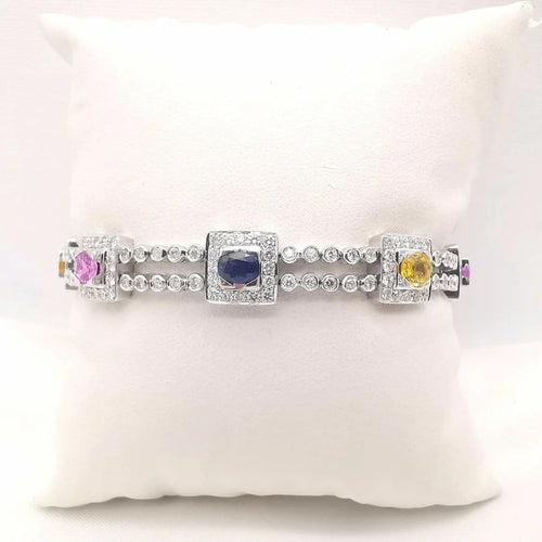 Bracelet Bracelet en or blanc 18 carats saphirs multicolores et diamants 58 Facettes Bracelet or blanc saphirs diamants certifié HRD Anvers