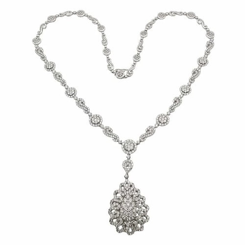 Collier Collier en or blanc 18 carats et diamants taille brillant 58 Facettes