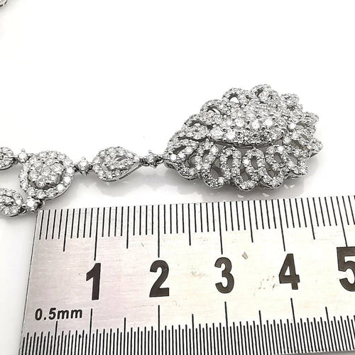 Collier Collier en or blanc 18 carats et diamants taille brillant 58 Facettes