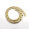 Collier Collier maillons haricots doublés en or 18 carats deux tons 58 Facettes