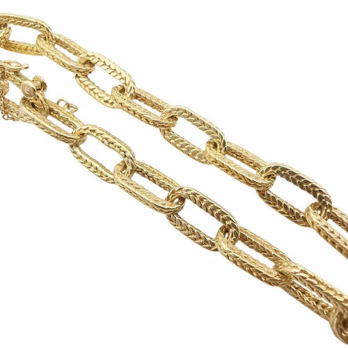 Bracelet Bracelet en or jaune 18 carats avec chaînette de sûreté 58 Facettes