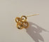 Broche Broche ancienne quadrilobée en or jaune 18 carats et diamant 58 Facettes