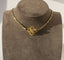 Broche Broche ancienne quadrilobée en or jaune 18 carats et diamant 58 Facettes