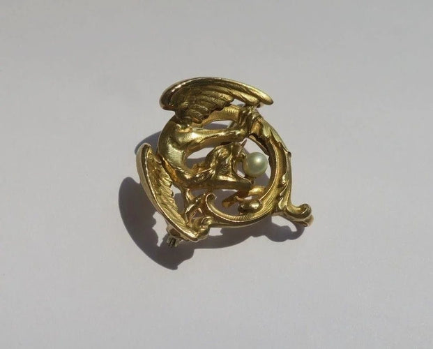 Broche Broche chimère en or jaune 18 carats et perle 58 Facettes
