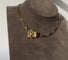 Broche Broche chimère en or jaune 18 carats et perle 58 Facettes