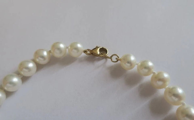 Bracelet Bracelet en or jaune et perles de culture 58 Facettes