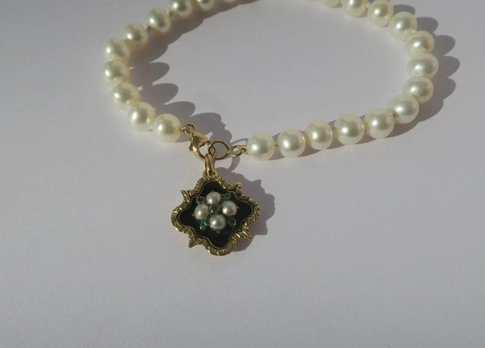 Bracelet Bracelet en or jaune et perles de culture 58 Facettes