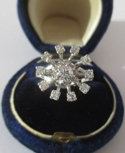Bague 51 Bague marguerite en or blanc, platine et diamants 58 Facettes