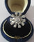 Bague 51 Bague marguerite en or blanc, platine et diamants 58 Facettes