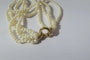 Bracelet Bracelet quatre rangs en or jaune et perles de culture 58 Facettes