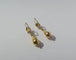 Boucles d'oreilles Boucles d’oreilles dormeuses pendantes fuseaux en or 18 carats 58 Facettes
