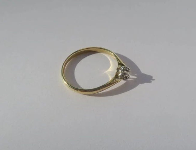 Bague 57 Bague solitaire deux ors 18 carats, diamant taille brillant 58 Facettes