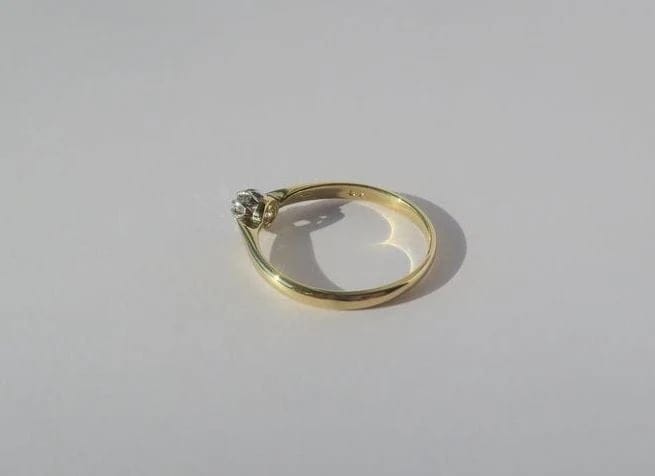 Bague 57 Bague solitaire deux ors 18 carats, diamant taille brillant 58 Facettes