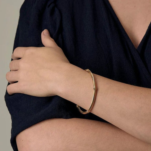 Bracelet Bracelet jonc torsadé en or jaune et or blanc 18K 58 Facettes