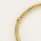 Bracelet Bracelet jonc torsadé en or jaune et or blanc 18K 58 Facettes