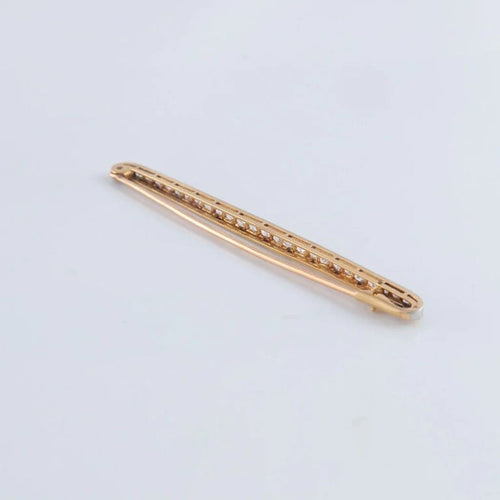 Broche Broche linéaire en or jaune 18K et platine sertie de diamants 58 Facettes