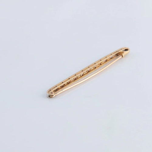 Broche Broche linéaire en or jaune 18K et platine sertie de diamants 58 Facettes