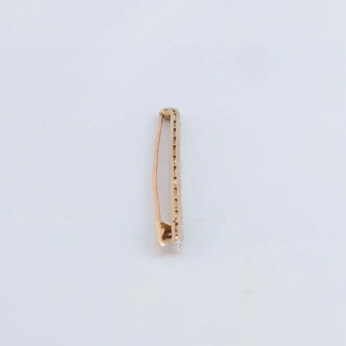 Broche Broche linéaire en or jaune 18K et platine sertie de diamants 58 Facettes