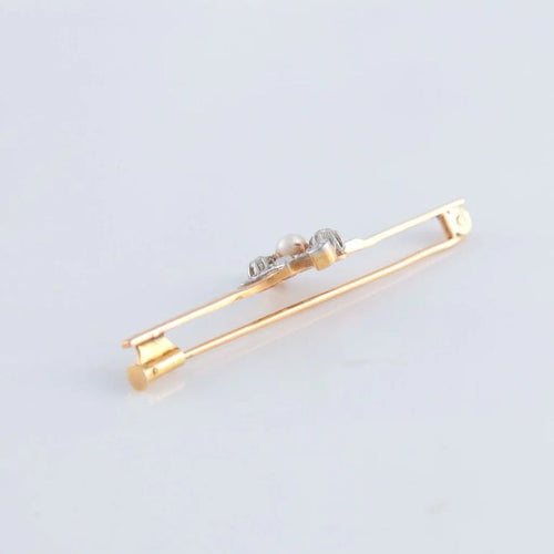 Broche Broche en or jaune 18K et platine avec diamants et perle 58 Facettes