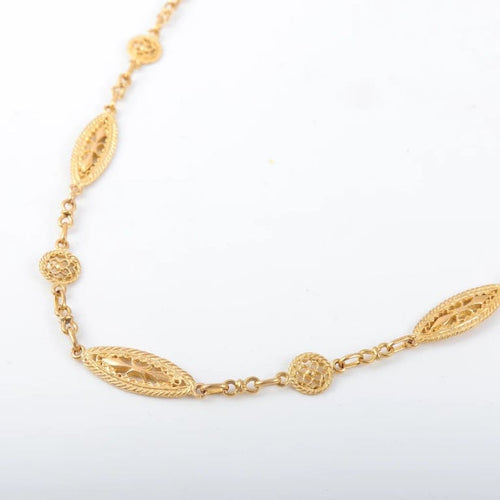 Collier Collier à motifs filigranés en or jaune 18 carats 58 Facettes