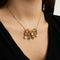 Collier Collier nœud en or jaune 18 carats avec perles, diamants et rubis 58 Facettes