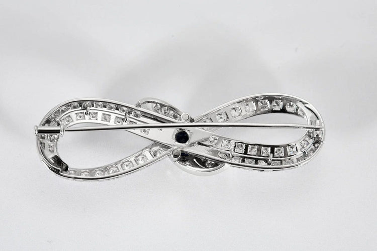 Broche Infini - Broche ancienne en platine, diamants et saphir 58 Facettes
