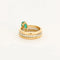 Bague 50 Bague multi-anneaux torsadés en or jaune, platine, diamants et émeraude 58 Facettes
