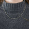 Collier Chaîne motif boules et barrettes en or jaune et or blanc 14K 58 Facettes