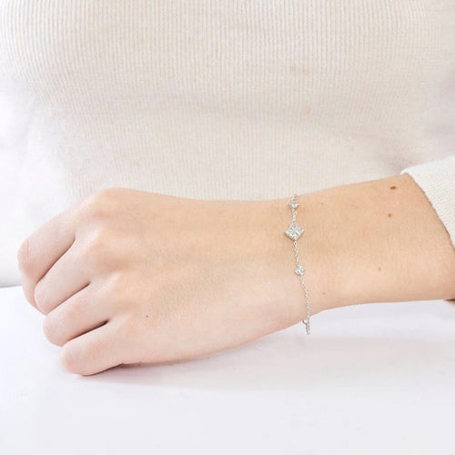 Bracelet Bracelet 3 motifs en or blanc 18K et diamants taille princesse 58 Facettes