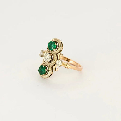 Bague 52 Bague ancienne en or rose et or blanc avec diamants et émeraudes 58 Facettes