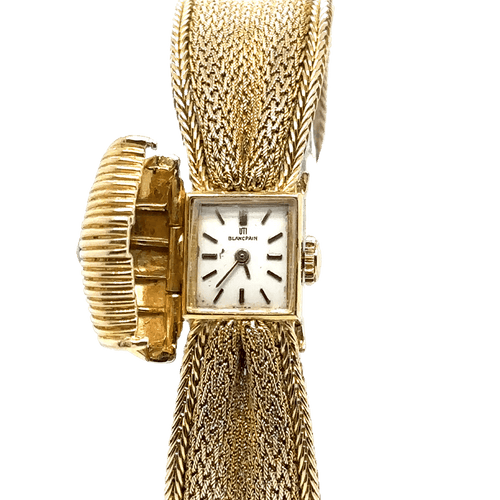 Montre Blancpain - Montre mystérieuse en or jaune et diamant 58 Facettes 1.0000191/1