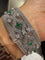 Bracelet Bracelet vintage en or blanc 18 carats serti de diamants et émeraudes 58 Facettes 1.0000651/3