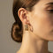 Boucles d'oreilles Cartier - Boucles d’oreilles Bergame en or jaune et diamants 58 Facettes 1.0001077/1
