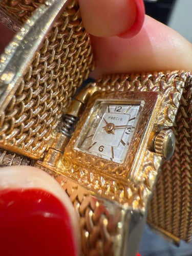 Montre Montre bracelet ruban tressé en or jaune 18 carats et diamants 58 Facettes 1.0000912/1