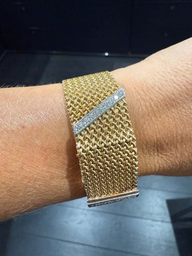 Montre Montre bracelet ruban tressé en or jaune 18 carats et diamants 58 Facettes 1.0000912/1