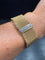 Montre Montre bracelet ruban tressé en or jaune 18 carats et diamants 58 Facettes 1.0000912/1