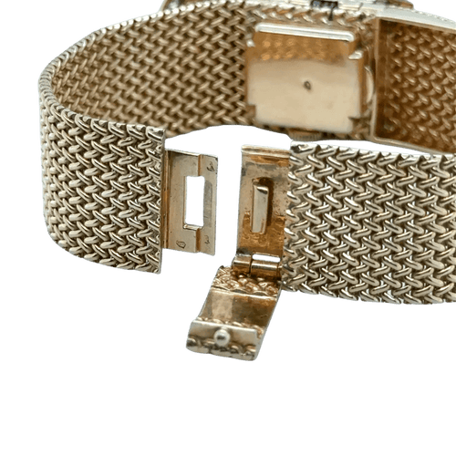 Montre Montre bracelet ruban tressé en or jaune 18 carats et diamants 58 Facettes 1.0000912/1