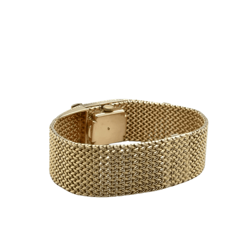Montre Montre bracelet ruban tressé en or jaune 18 carats et diamants 58 Facettes 1.0000912/1
