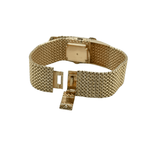 Montre Montre bracelet ruban tressé en or jaune 18 carats et diamants 58 Facettes 1.0000912/1