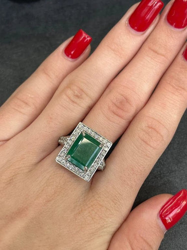 Bague 57 Bague en or blanc 18K avec émeraude 6 ct et diamants 58 Facettes 00016301