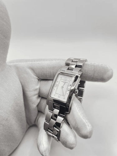 Montre Baume & Mercier Hampton MV045063 - Montre quartz en acier 24 x 40 mm 58 Facettes