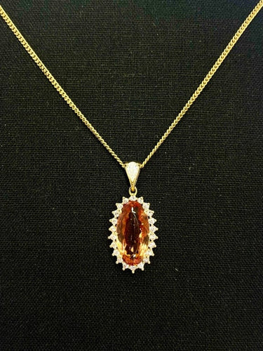 Pendentif Pendentif en or jaune 18K à topaze impériale et diamants 58 Facettes