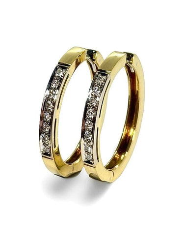 Boucles d'oreilles Créoles en or jaune 18K serties de diamants 0,50 ct 58 Facettes 1153