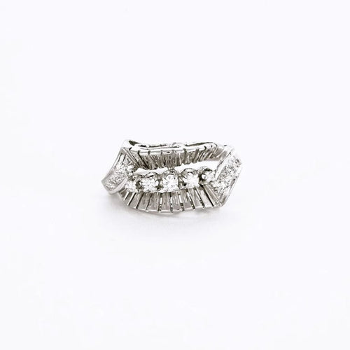 Bague 49 Bague lignes et volutes en or blanc et platine, sertie de diamants 58 Facettes