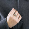 Bague 49 Bague lignes et volutes en or blanc et platine, sertie de diamants 58 Facettes