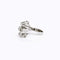 Bague 49 Bague lignes et volutes en or blanc et platine, sertie de diamants 58 Facettes