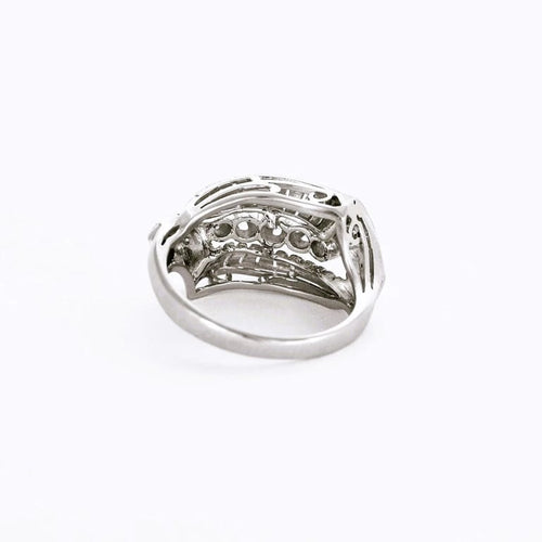 Bague 49 Bague lignes et volutes en or blanc et platine, sertie de diamants 58 Facettes