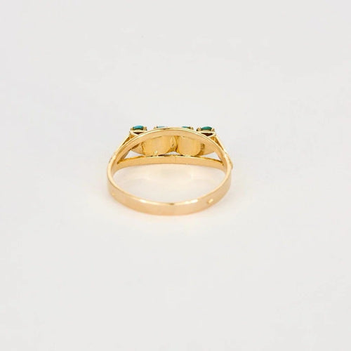 Bague 57 Bague jarretière en or rose et turquoises 58 Facettes