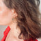 Boucles d'oreilles Boucles d'oreilles créoles à pastilles d'onyx en or jaune 18K 58 Facettes