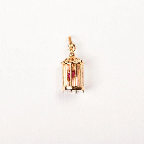 Pendentif Pendentif « L’amour en cage » en or rose 750 et rubis synthétique 58 Facettes 268
